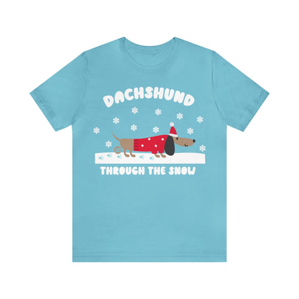 Dachshund Though The Snow Christmas Unisex Tee