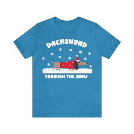 Dachshund Though The Snow Christmas Unisex Tee