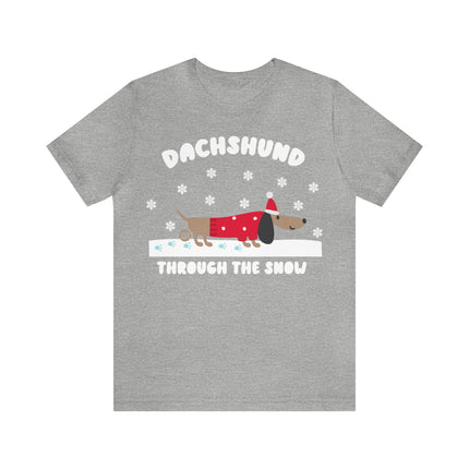 Dachshund Though The Snow Christmas Unisex Tee