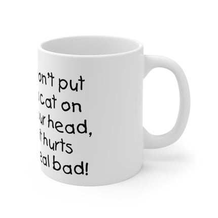 dont put cat on head Ceramic Mug