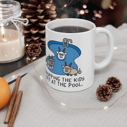 dropping kids pool Ceramic Mug